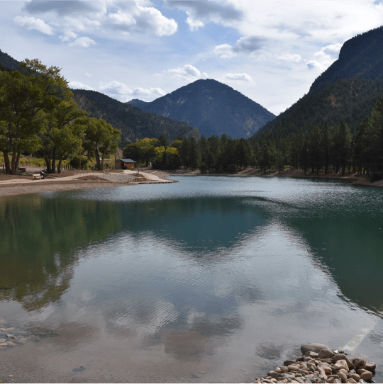 Eagle Rock Lake.JPG A calm lake surrounded by trees and mountains