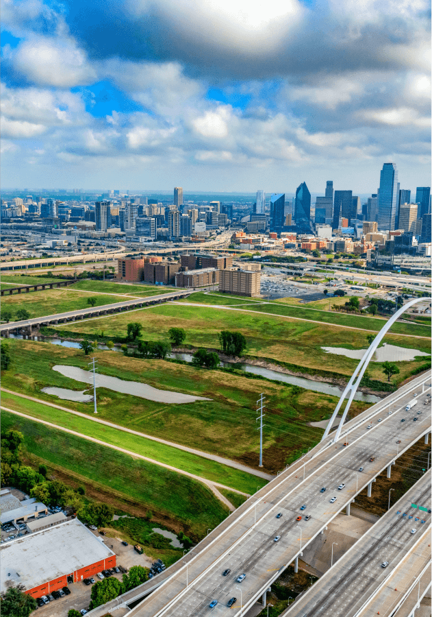 City and green space landscape with highway