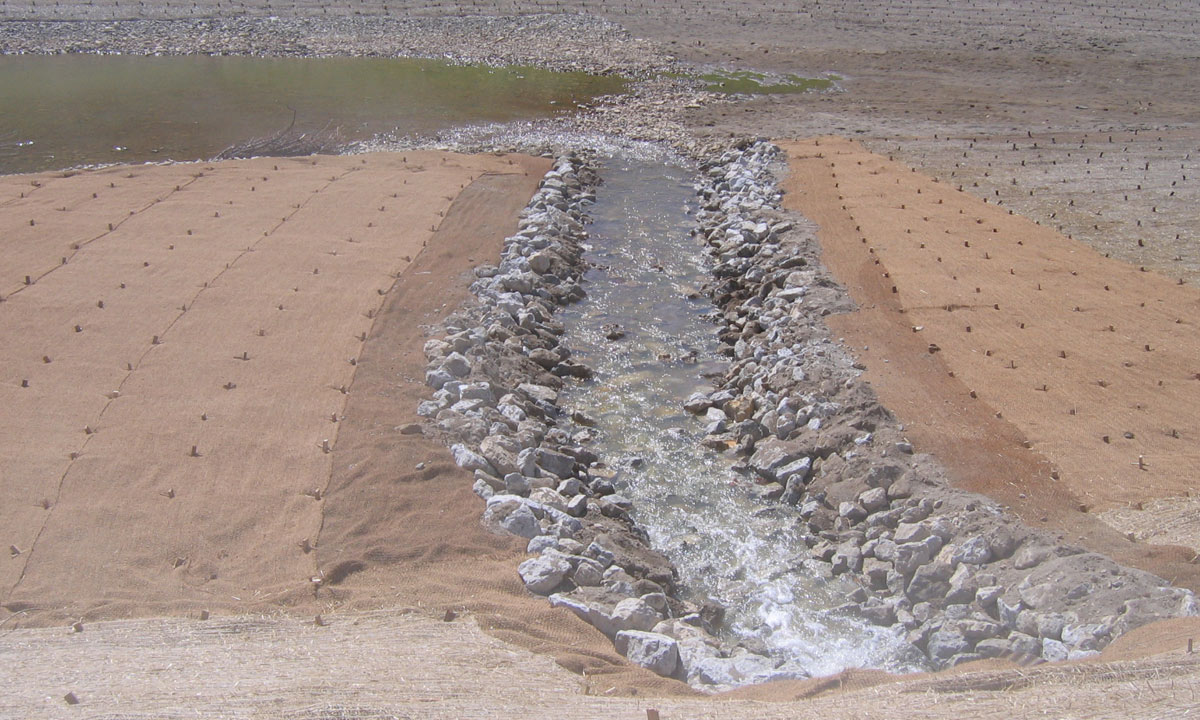 trench with rocks and flowing water